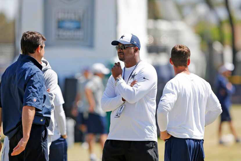 Dallas Cowboys assistant director of player personnel Will McClay (center) during a training...