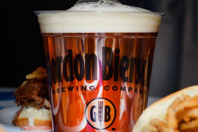 Gordon Biersch beer and barbeque sliders are displayed during the Las Vegas Food & Wine...