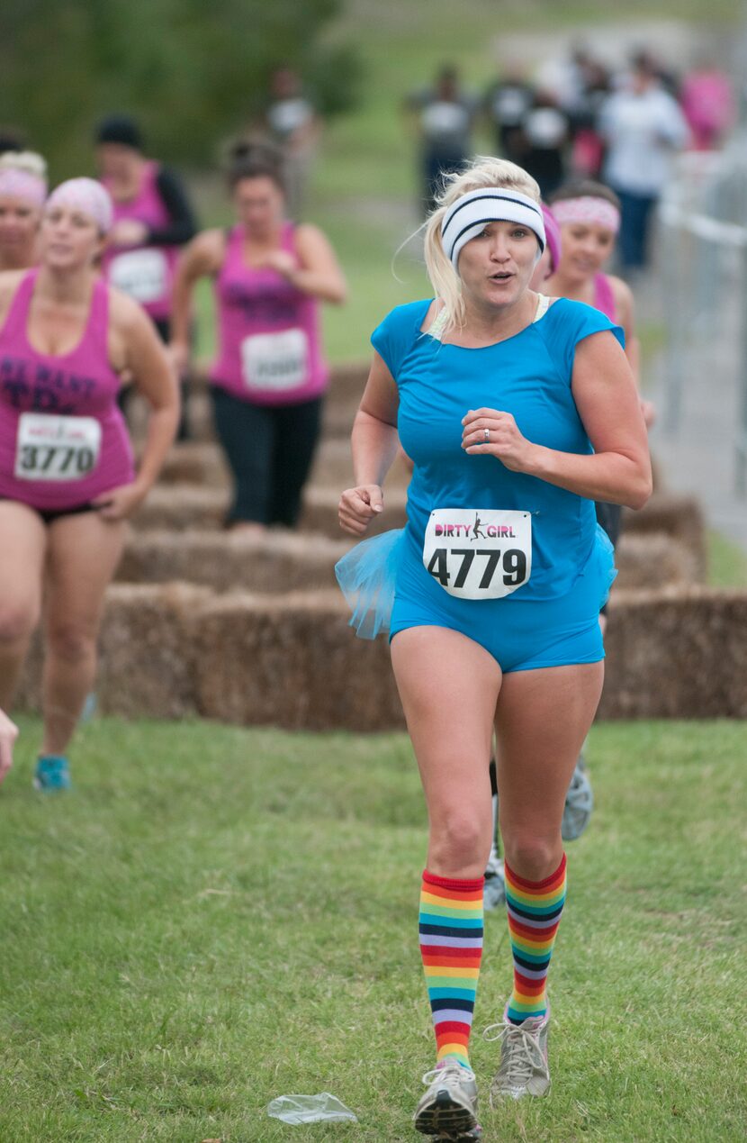 Women competing in the Dirty Girl Mud Run at Cedar Hill State Park on Saturday, Oct. 6, 2012.  