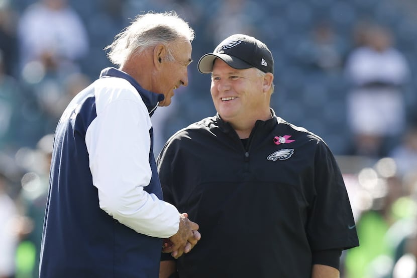 Dallas Cowboys defensive coordinator Monte Kiffin, left, and Philadelphia Eagles head coach...