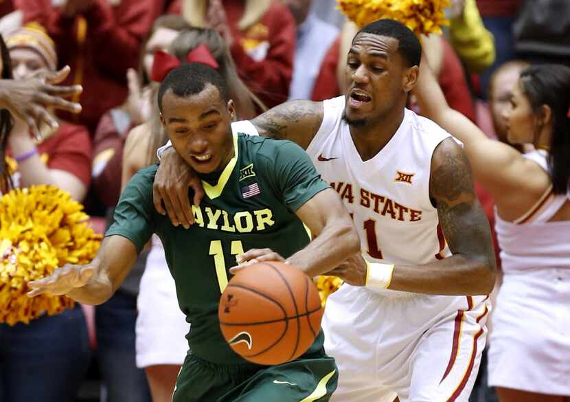 AMES, IA - JANUARY 9: Monte Morris #11 of the Iowa State Cyclones fouls Lester Medford #11...
