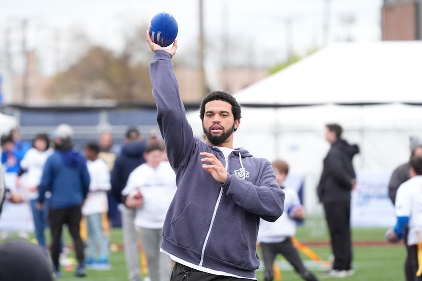 USC quarterback Caleb Williams throws during a Play Football Prospect Clinic with Special...