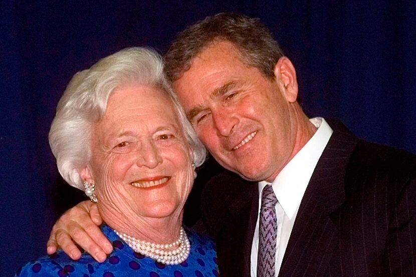  In this June 10, 1999,  photo, then-Texas Gov. George W. Bush, right, gives his mother,...