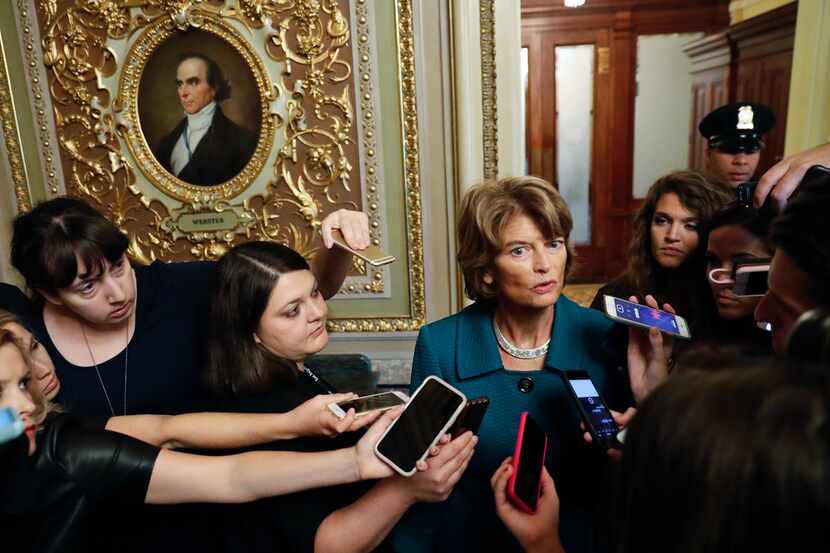 Sen. Lisa Murkowski, R-Alaska, speaks to members of the media after a vote to advance Brett...