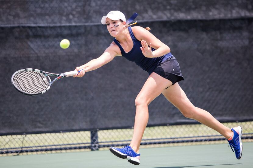 Highland Park's Madison McBride - part of a mixed doubles team with Phillip Quinn - works to...
