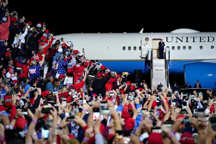 President Donald Trump arrives for a campaign rally at Newport News/Williamsburg...
