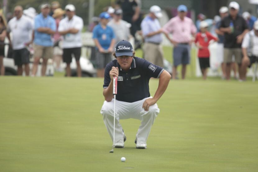 Jason Dufner lines up a putt on the 9th green during the first  round of the Crowne Plaza...