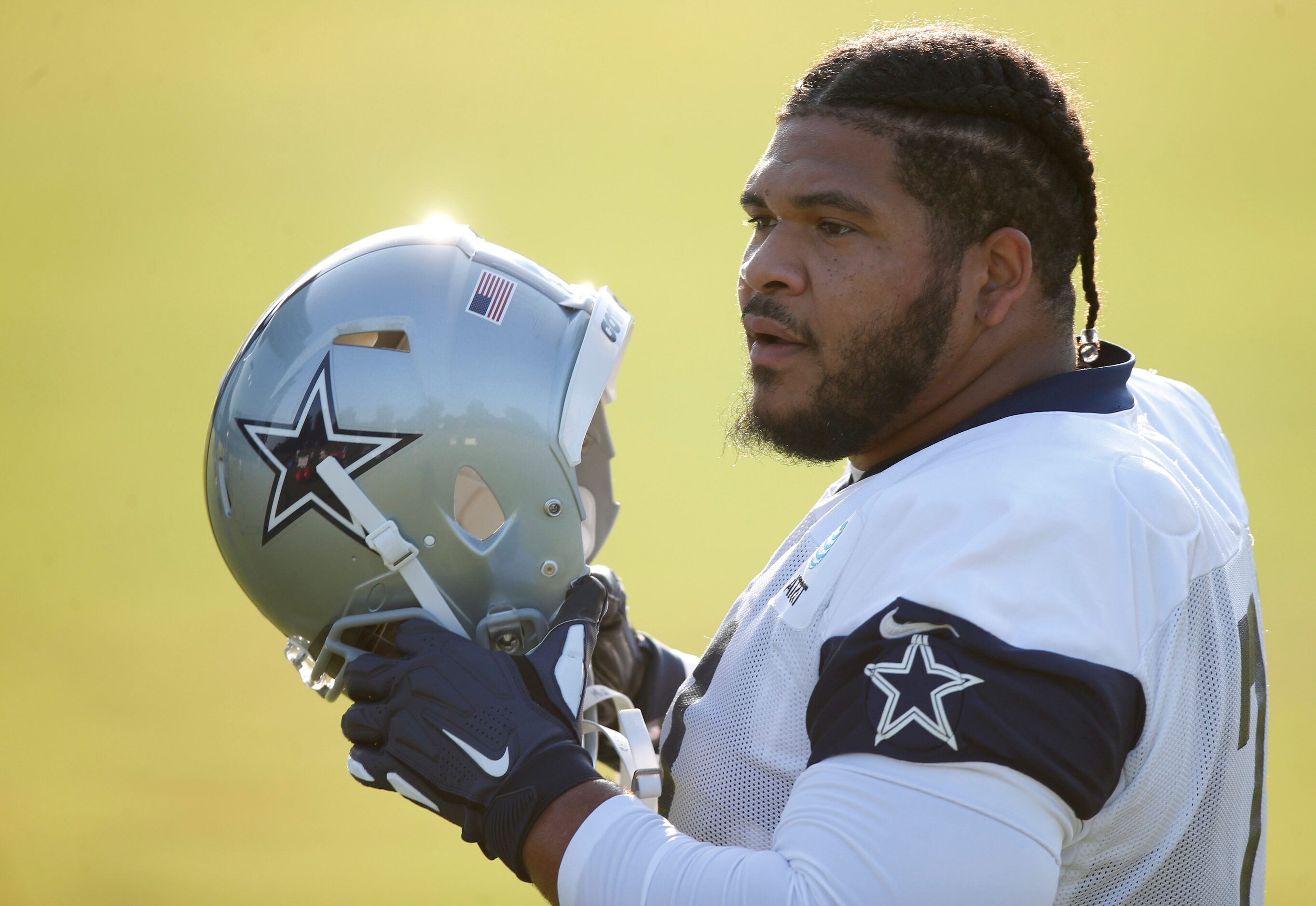 Dallas Cowboys offensive tackle La'el Collins (71) prepares to put his helmet on during the...