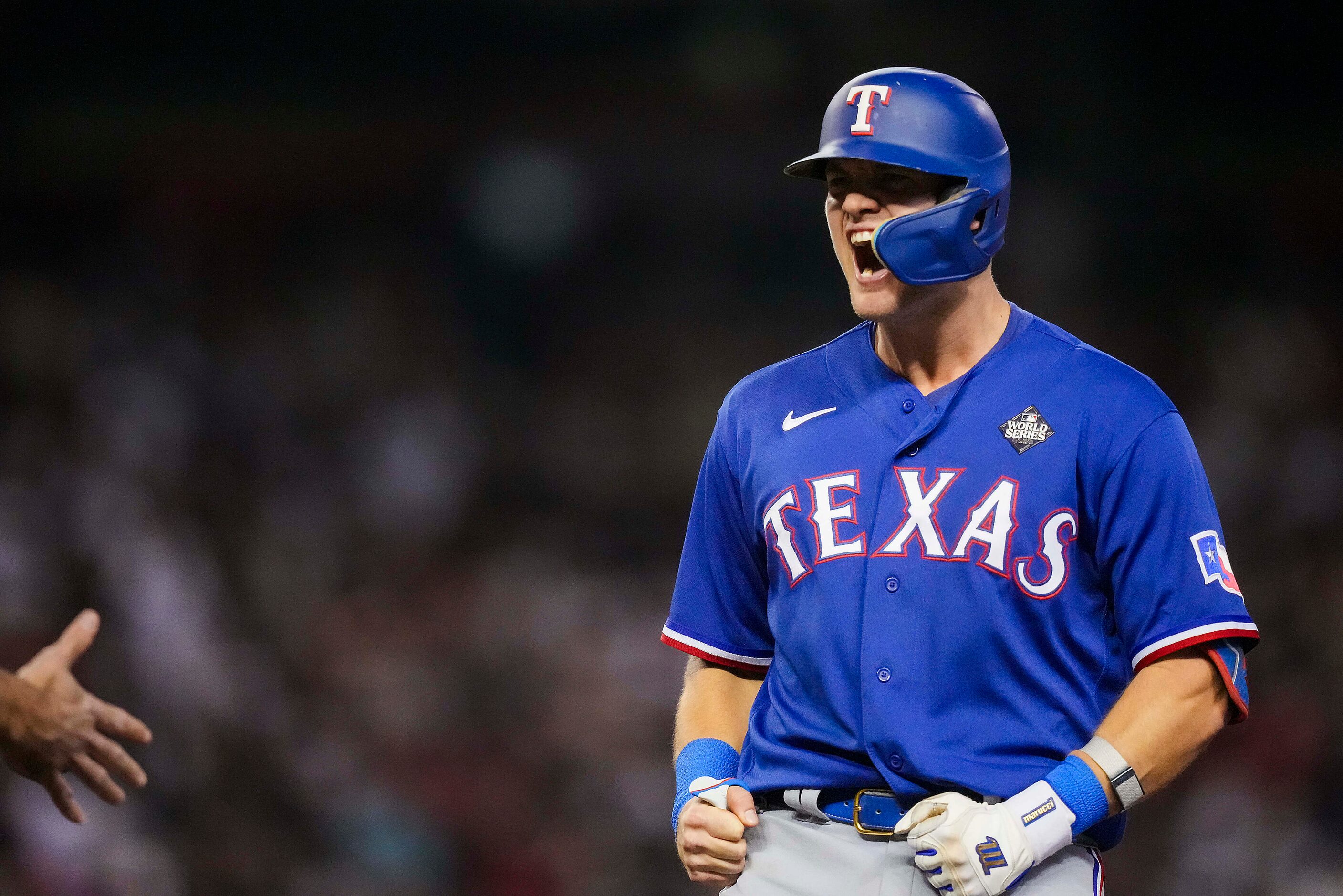 Texas Rangers’ Josh Jung celebrates after a leadoff single during the ninth inning in Game 5...