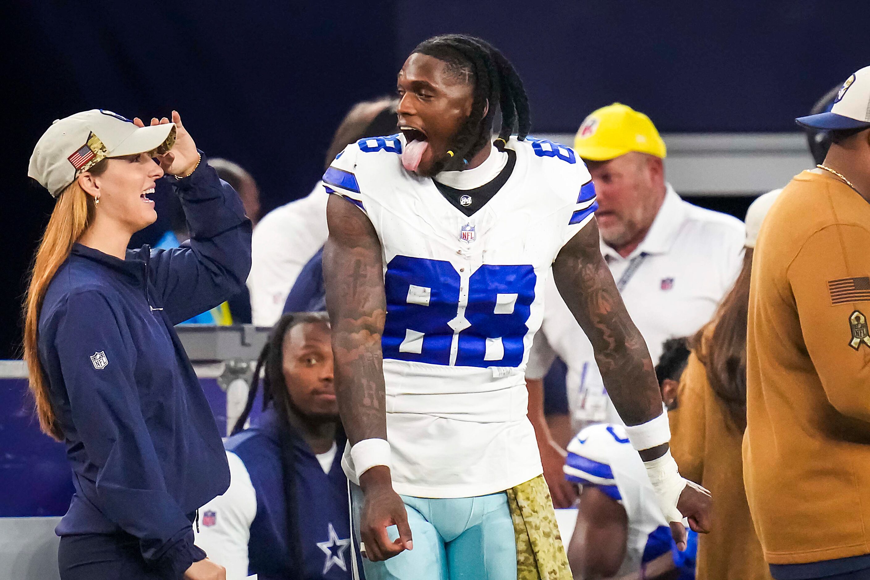 Dallas Cowboys wide receiver CeeDee Lamb (88) celebrates on the sidelines during the second...