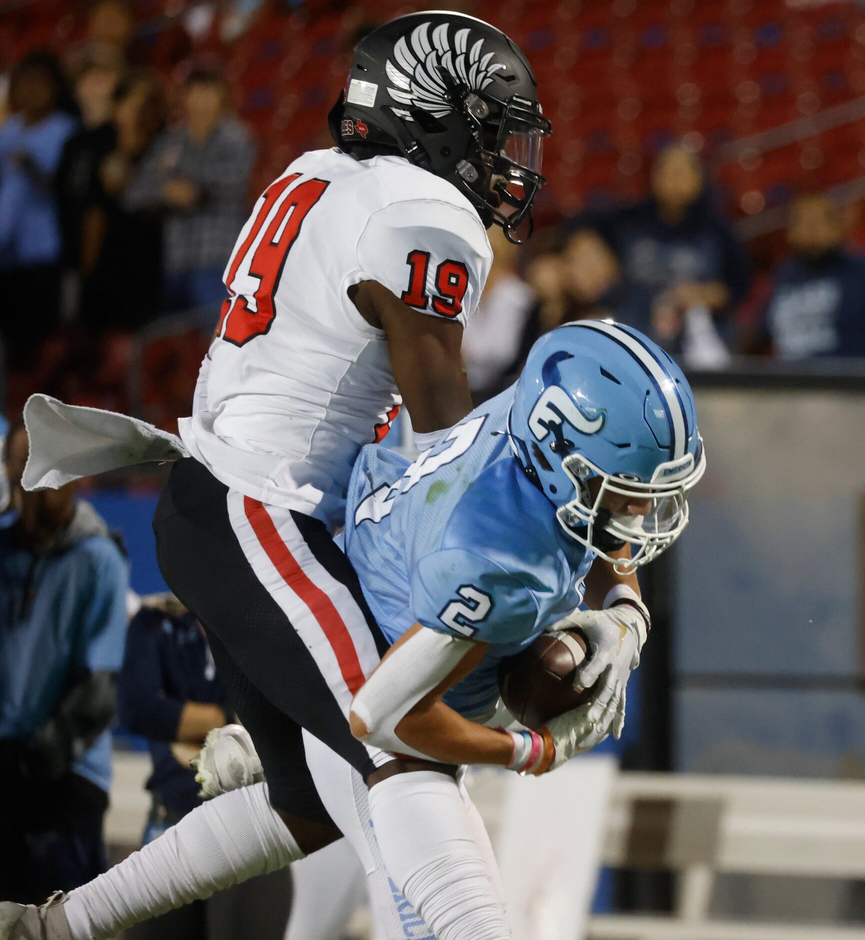 Emerson’s Kylen Evans (2), right, receives a pass past Argyle’s Jaaqwan Felton during the...