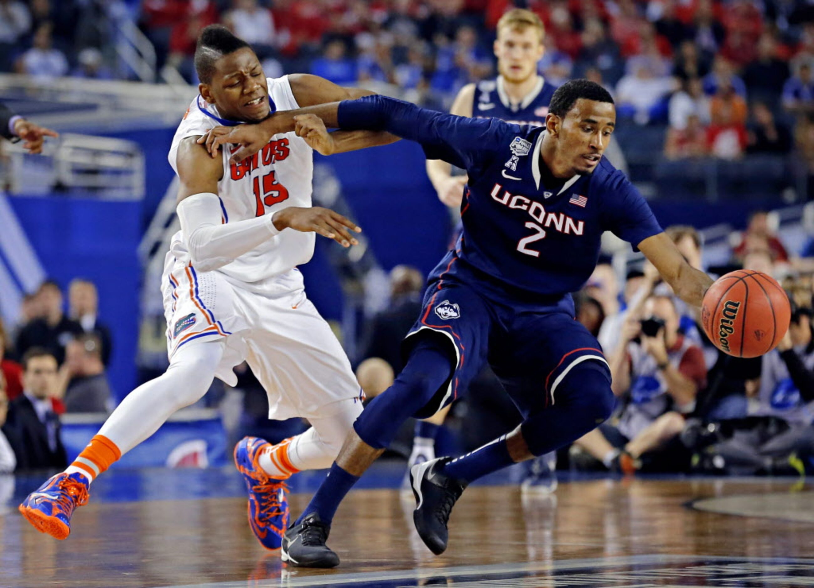 Connecticut Huskies forward DeAndre Daniels (2) blocks out Florida Gators forward Will...