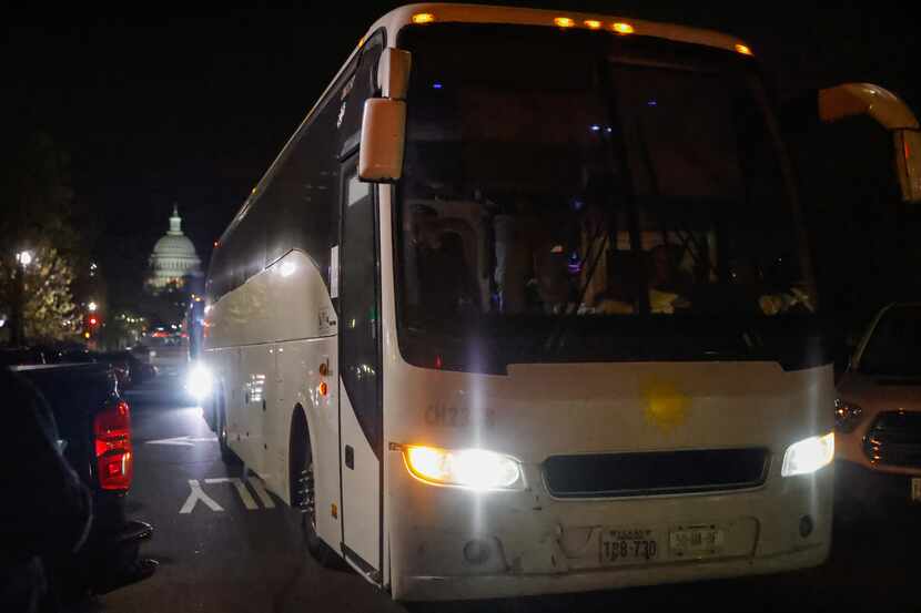 A couple of buses with migrants from Texas arrive in Washington, D.C. on Thursday, April 21,...
