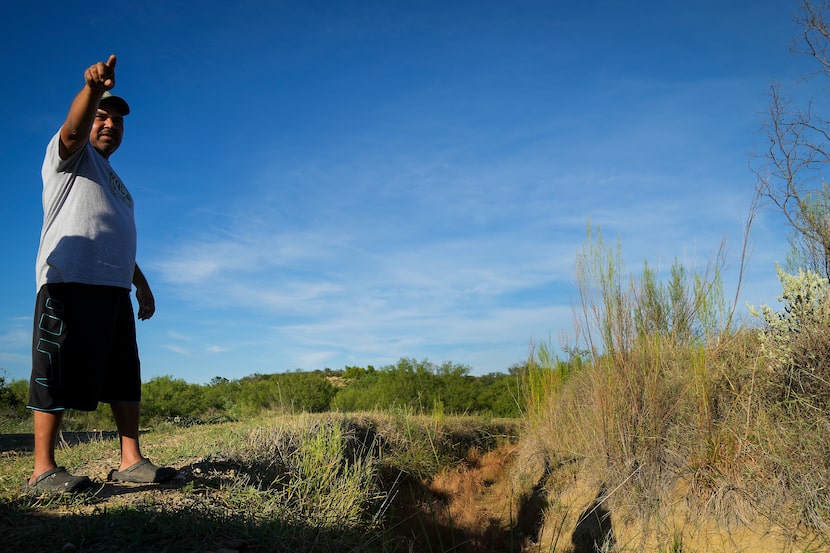 Renee Herrera points out the area where DPS Special Agent Anthony Salas died in the crash of...