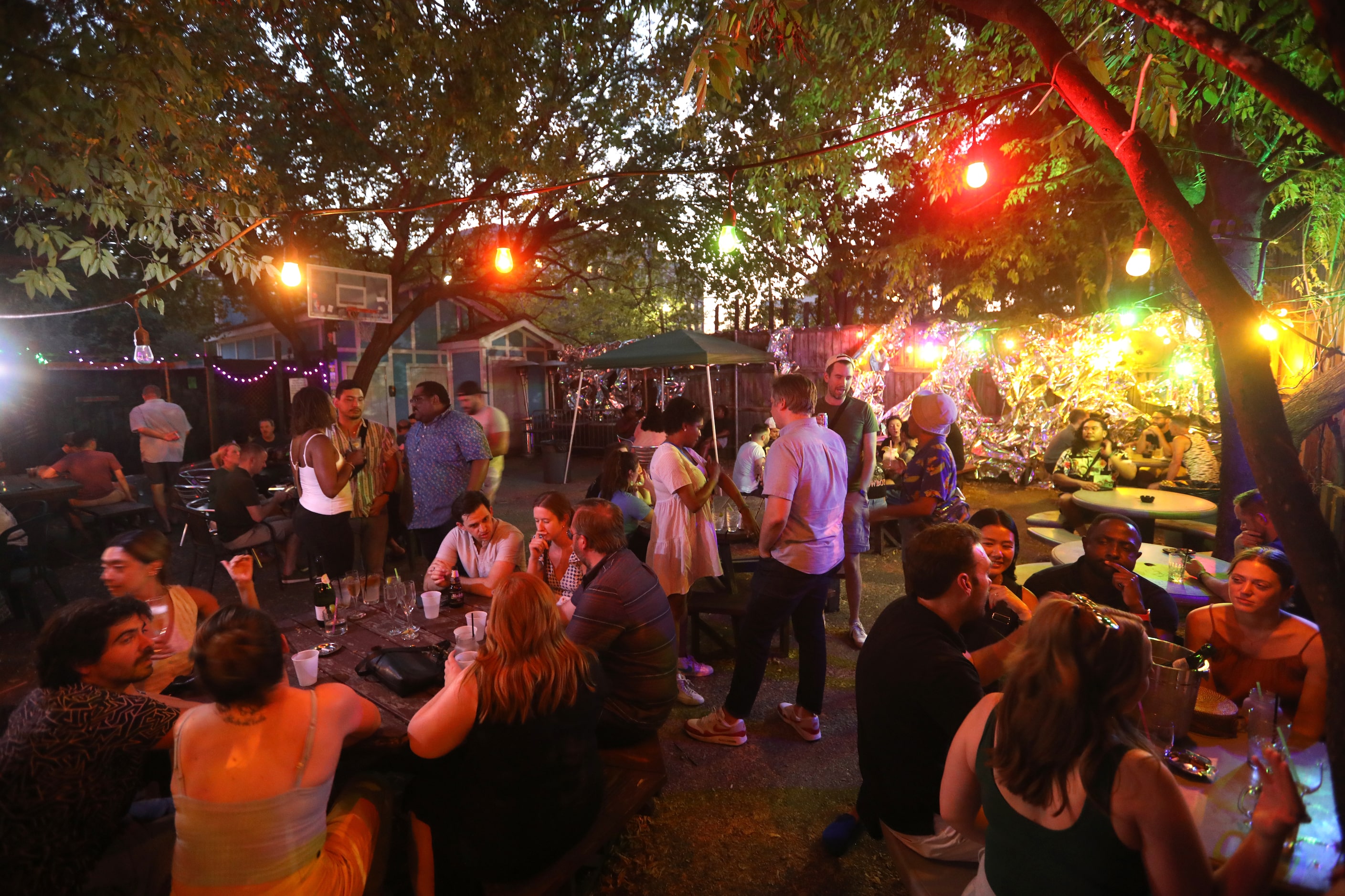 Guests enjoy one last evening at the Grapevine Bar in Dallas, TX, on Aug 23, 2023.  (Jason...