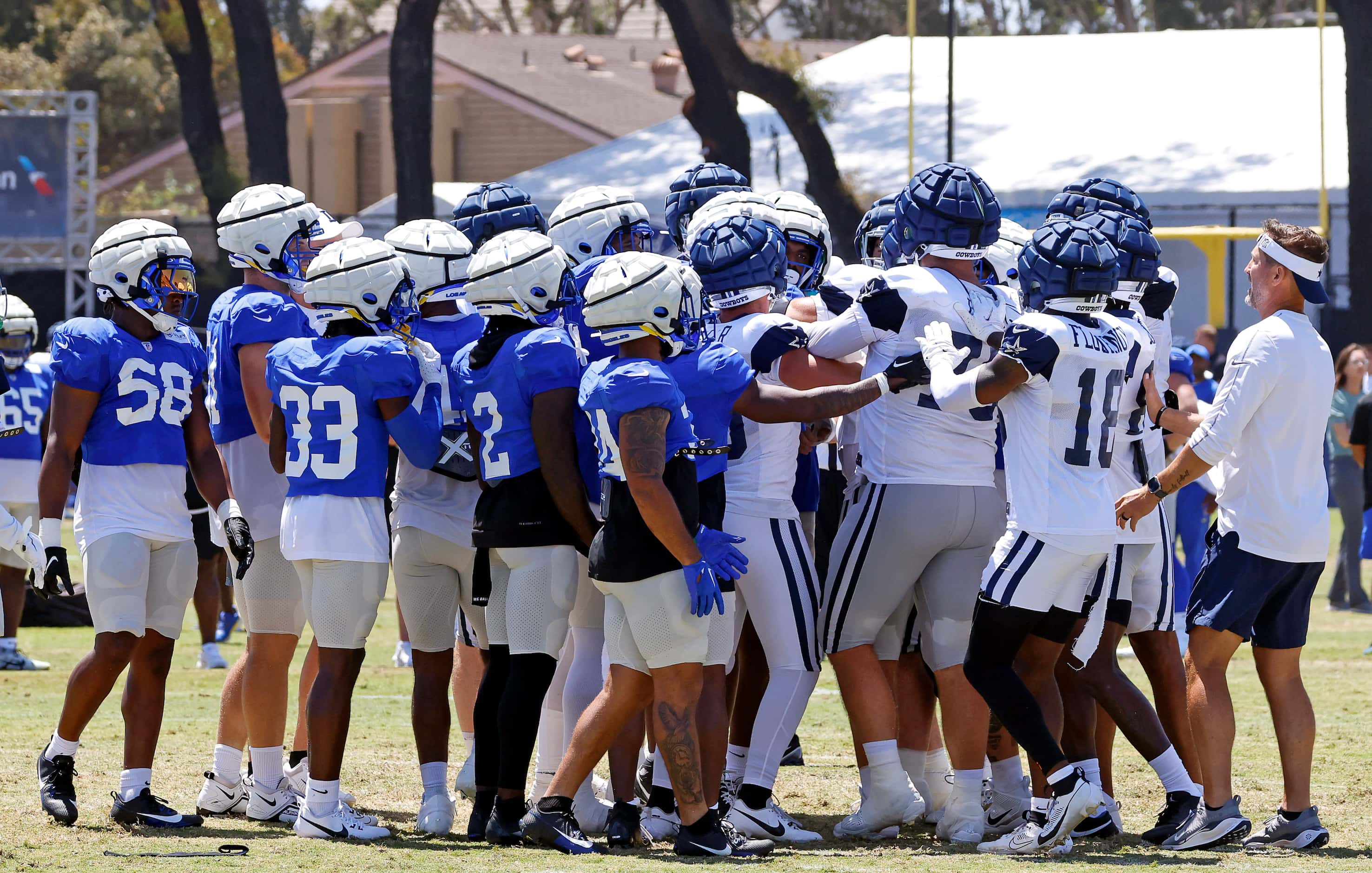 A skirmish between the Dallas Cowboys offense and the Los Angeles Rams defense during a...