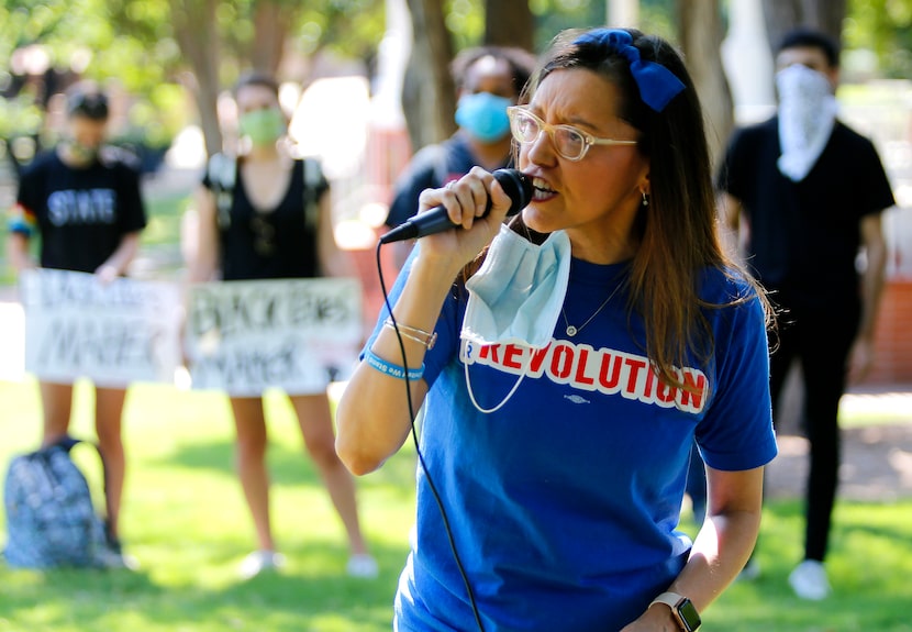 Dallas resident Kristi Lara, an organizer with Our Revolution Texas, speaks at a protest...