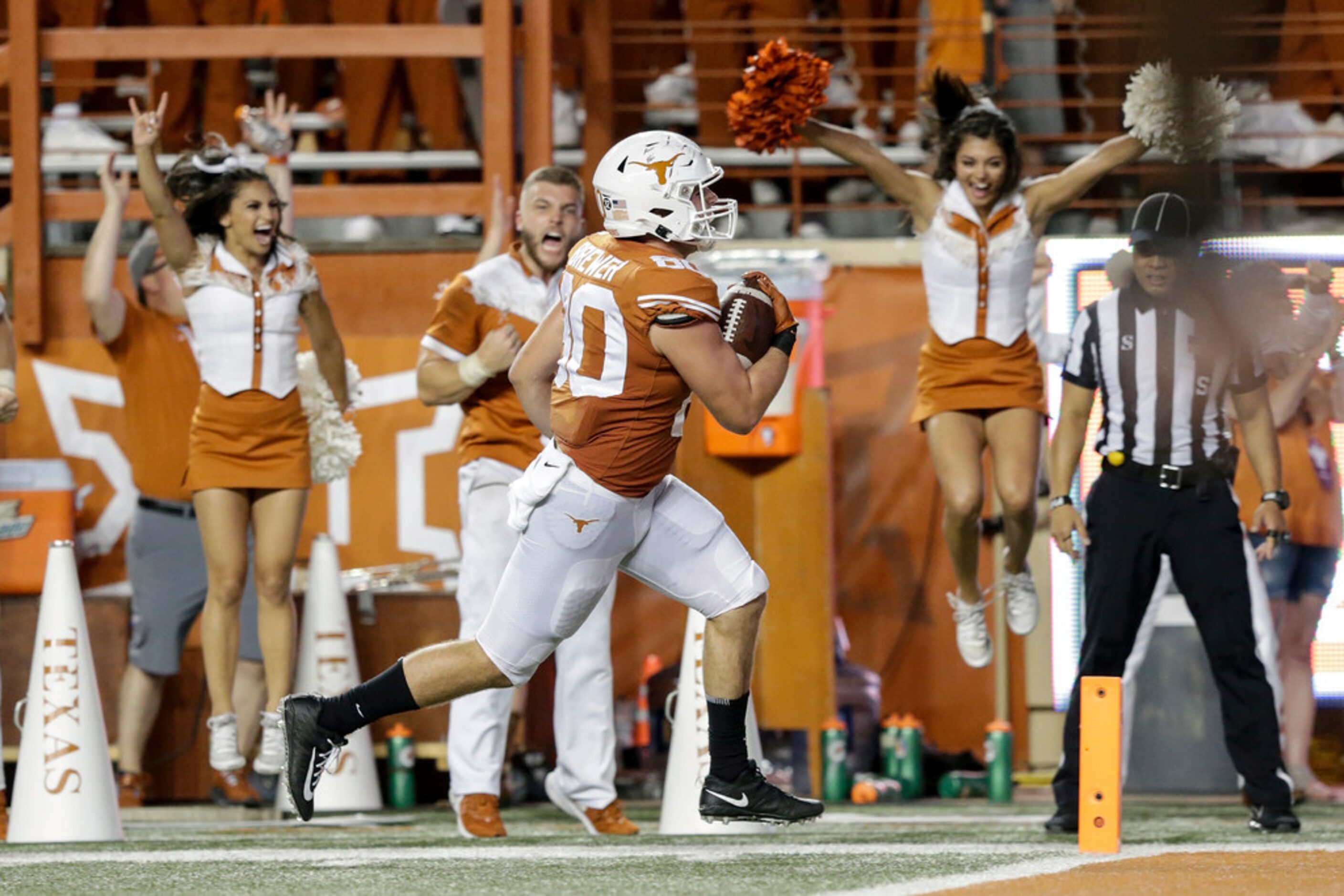 AUSTIN, TX - SEPTEMBER 21:  Cade Brewer #80 of the Texas Longhorns catches a pass for a...