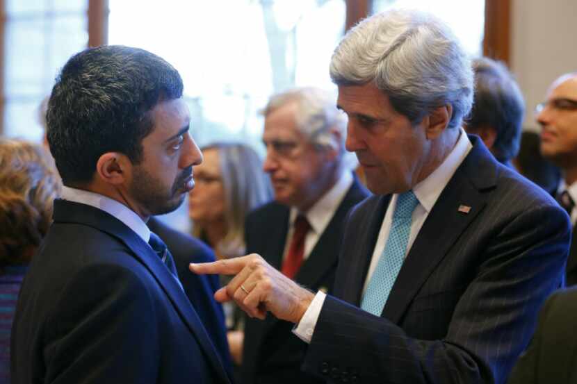 U.S. Secretary of State John Kerry speaks with United Arab Emirates Foreign Minister...