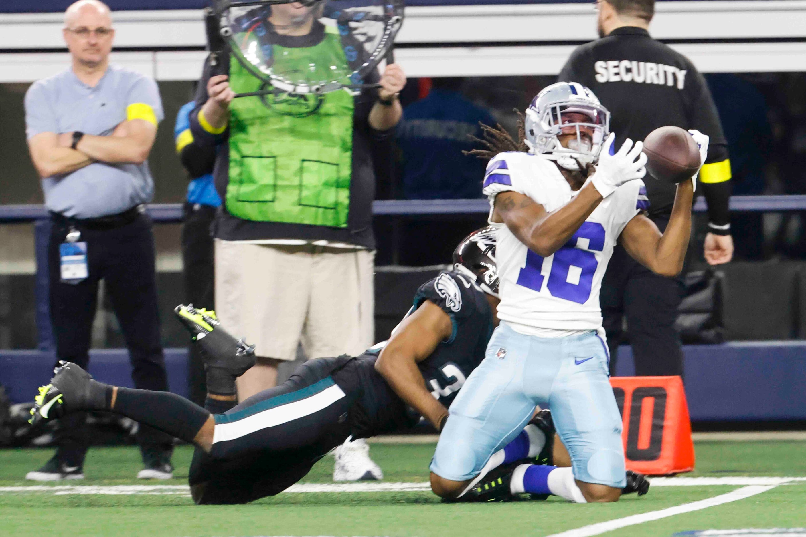 Dallas Cowboys wide receiver T.Y. Hilton (16), right, receives a pass past Philadelphia...