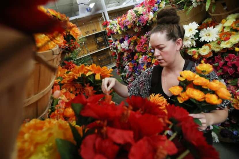 
Lindsay Vonhagel of Denton shops for artificial flowers at At Home.
