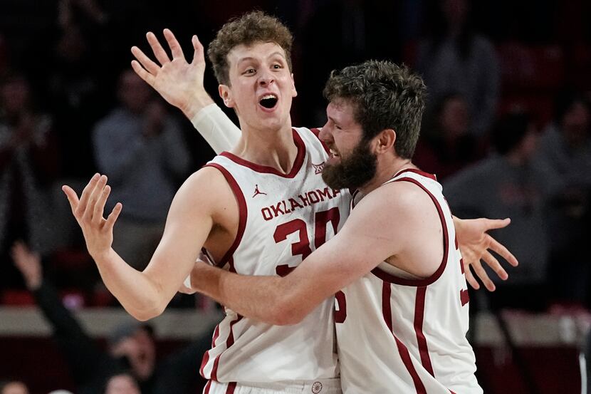 Oklahoma forward Jacob Groves (34) and forward Tanner Groves (35) celebrate in the finals...