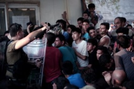  Special forces of Hellenic Coast Guard push back migrants waiting to be registered by...