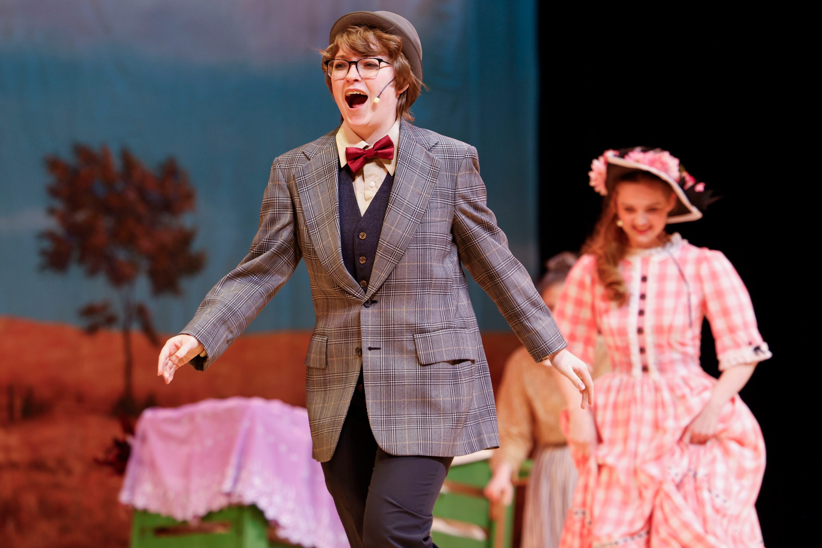 Cast member Max Hightower plays his role as Ali Hakim, during the opening night of the...