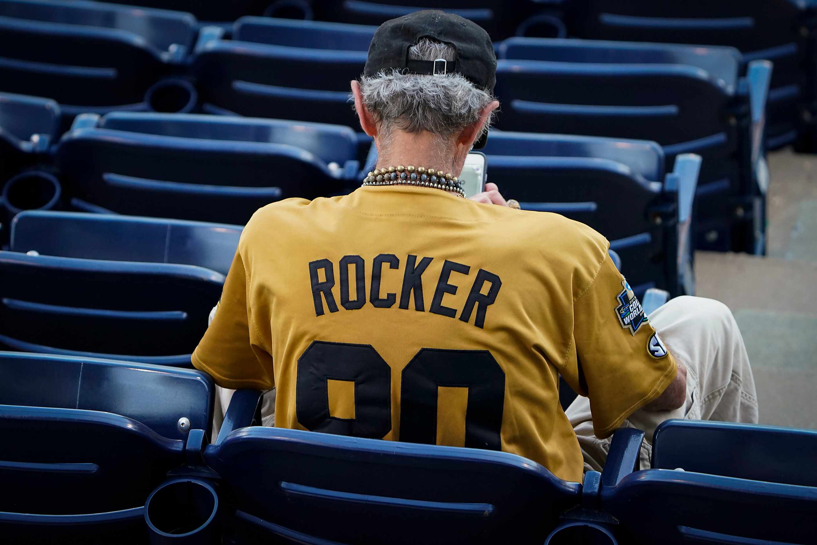 A Vanderbilt fan wears the jersey of pitcher Kumar Rocker during an NCAA baseball game...