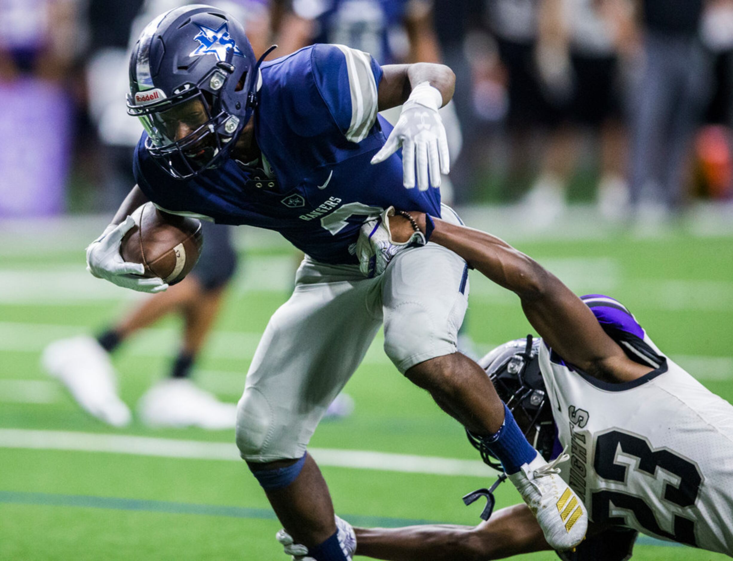 Frisco Lone Star wide receiver Jake Bogdon (2) is tackled by Frisco Independence defensive...