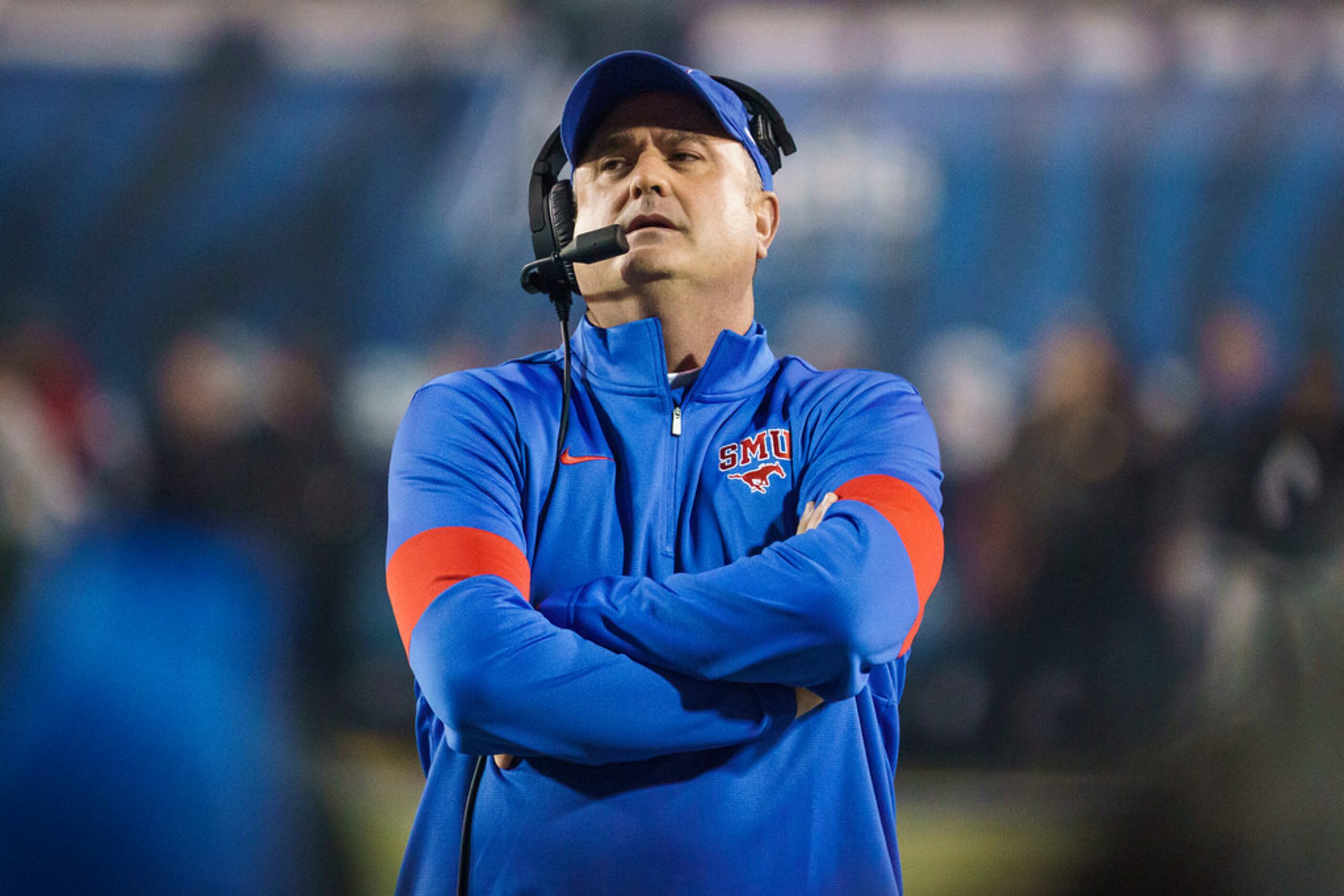 SMU head coach Sonny Dykes watches from the sidelines during the first half of an NCAA...