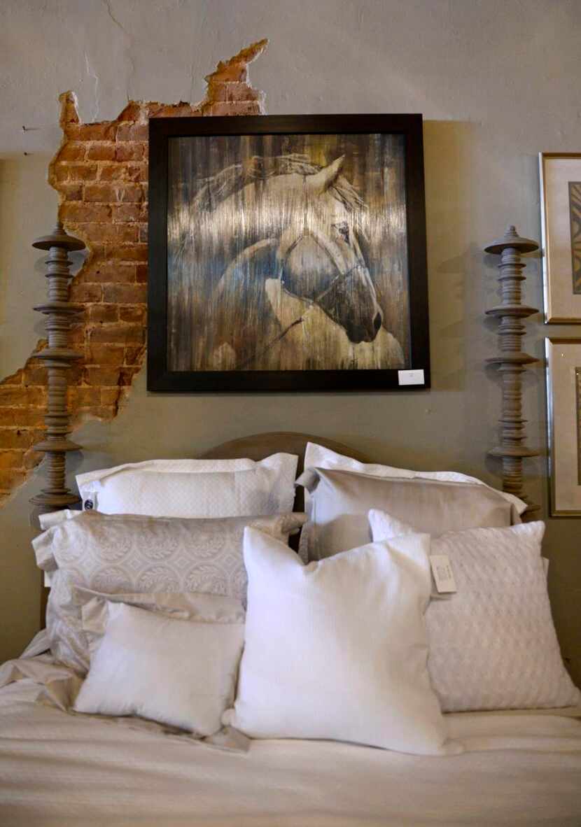 
Art and bedroom furniture is displayed at Home & Garden Trading Co. in downtown McKinney. 
