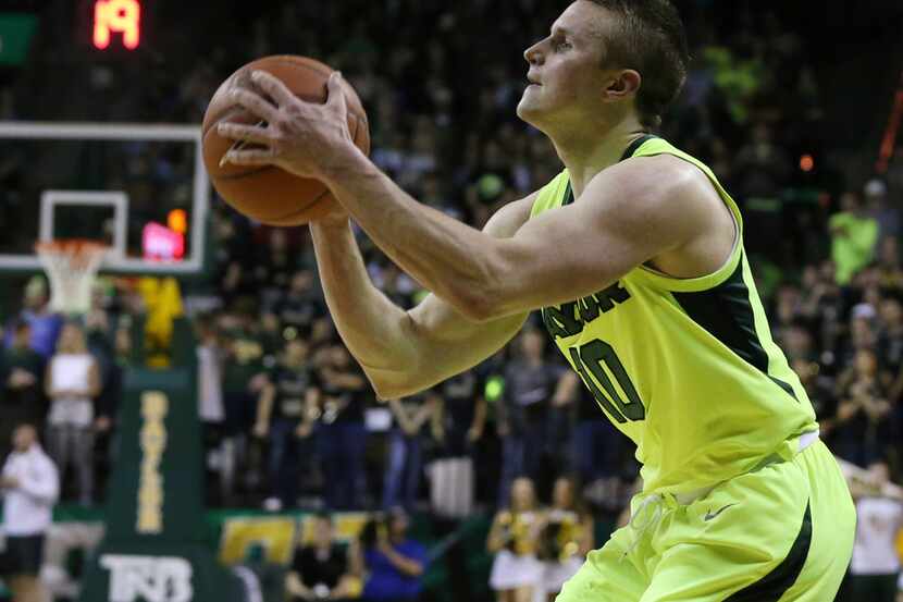 Baylor guard Makai Mason sets up for a three-point basket over TCU in the second half of an...