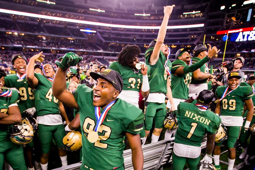 DeSoto's  Kristopher Ingram (92) celebrates with teammates after a victory over Cibolo...