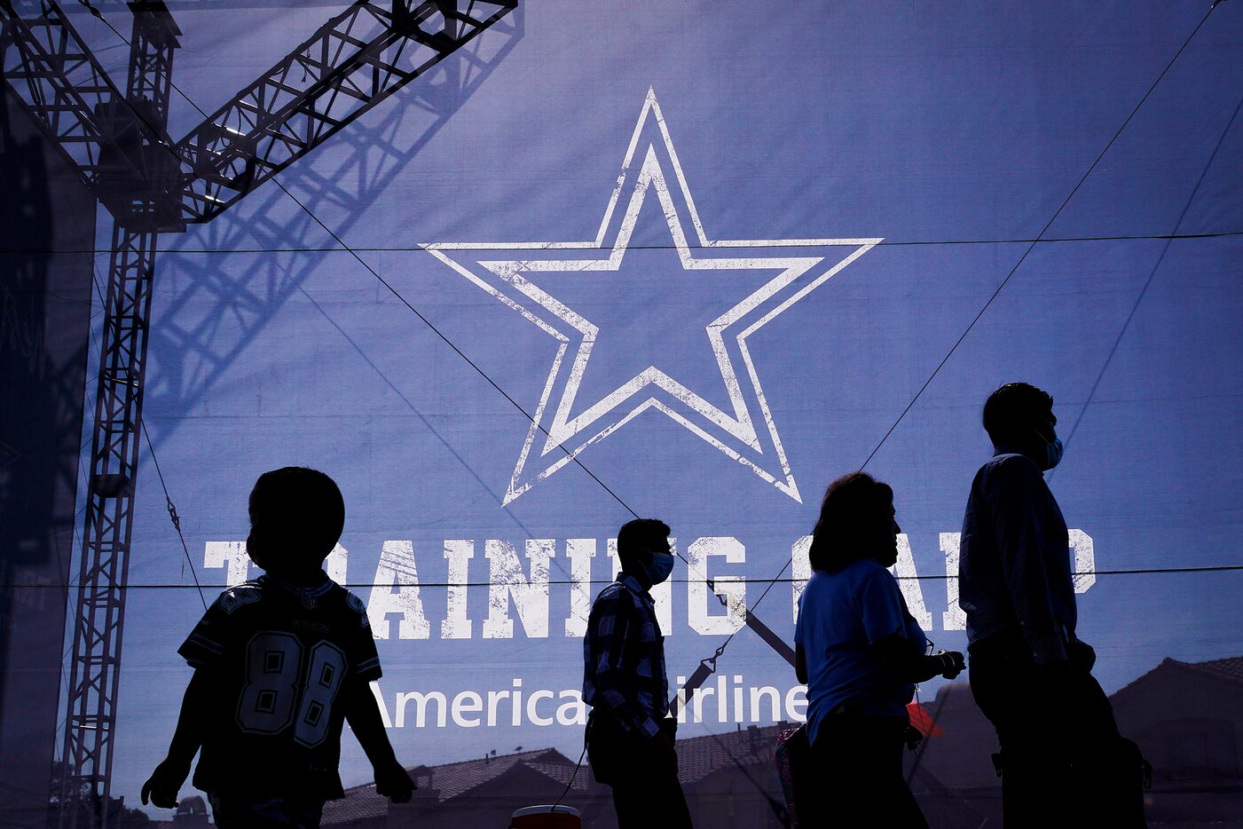 Fans enter the facility for the Dallas Cowboys first practice of the team’s training camp on...