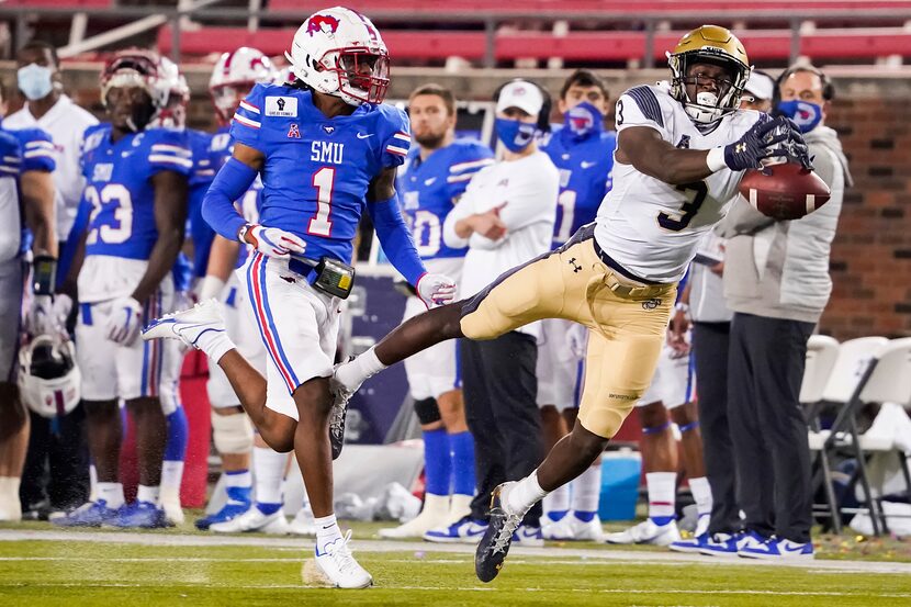 FILE - Navy wide receiver Mychal Cooper (3) has a pass go off his hands as SMU cornerback...