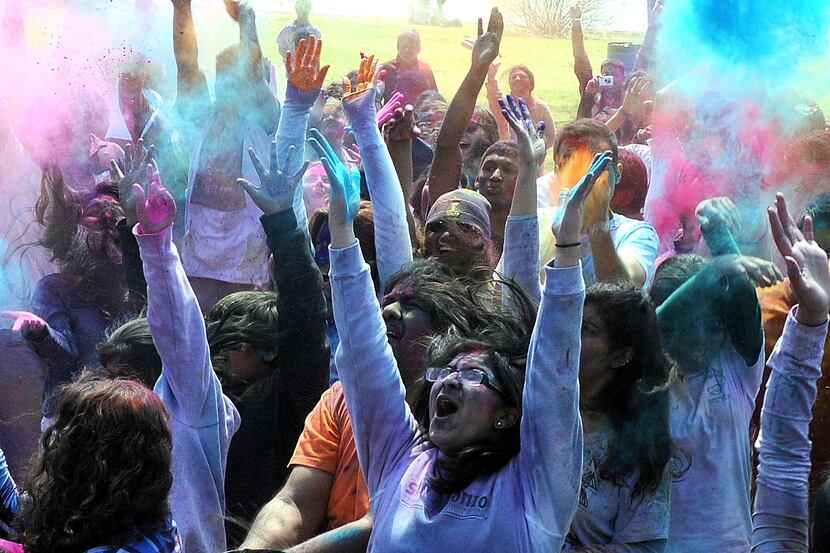 White clothes don't stay that way for long at the Holi Festival of Colors .