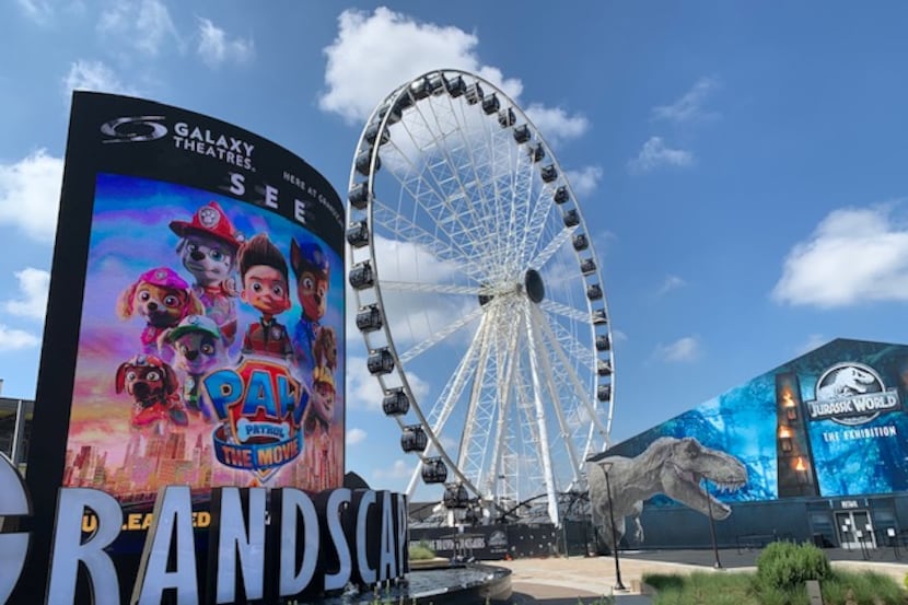 The 180-foot-tall Grandscape Wheel opened for its first riders on Sept. 10 at Grandscape in...