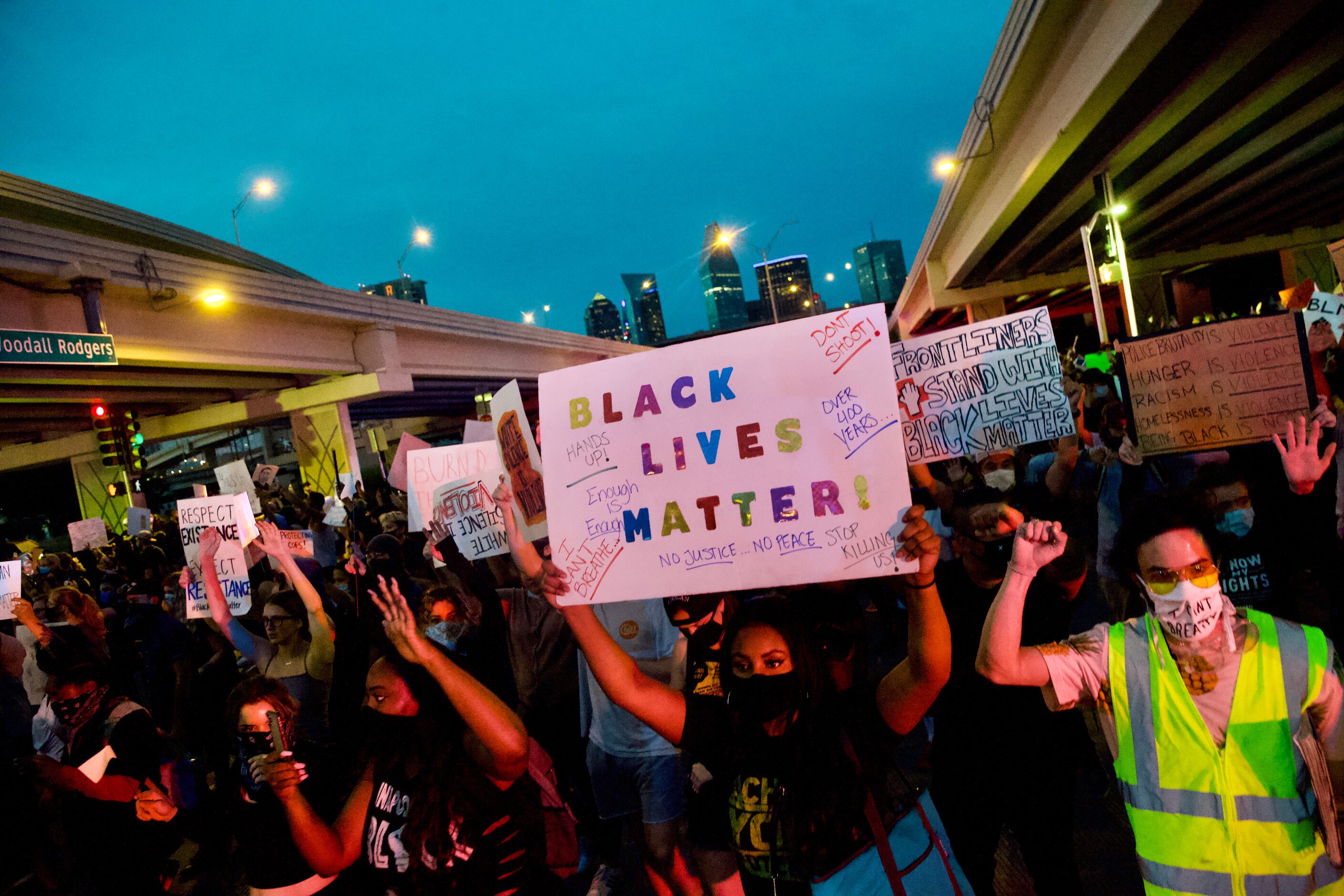 Protesters march from the Frank Crowley Courts building to the Margaret Hunt Hill bridge...