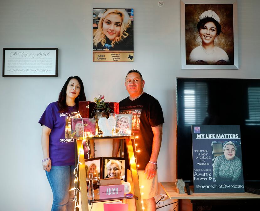Adolph Alvarez and his wife Peggy are pictured with their daughter’s urn and memorial at...