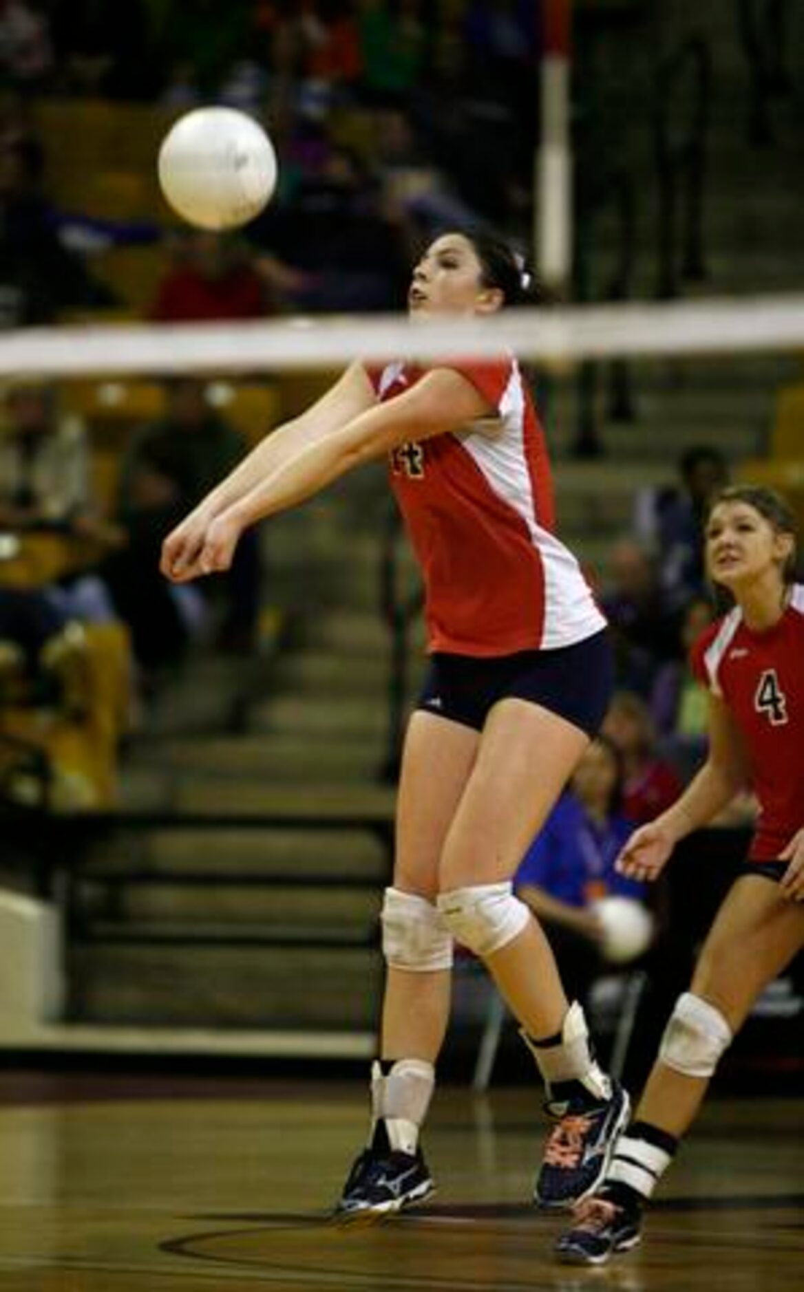 Aubrey's Jac Bullock (14) sets up a shot against Poth in the UIL 2A volleyball state...