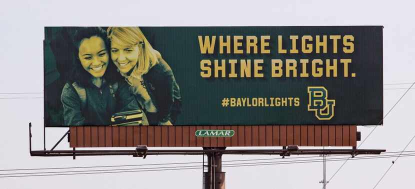 One of the billboards in the "Where Lights Shine Bright" campaign features Baylor President...