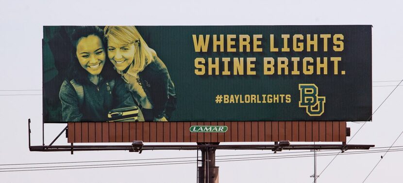 One of the billboards in the "Where Lights Shine Bright" campaign features Baylor President...