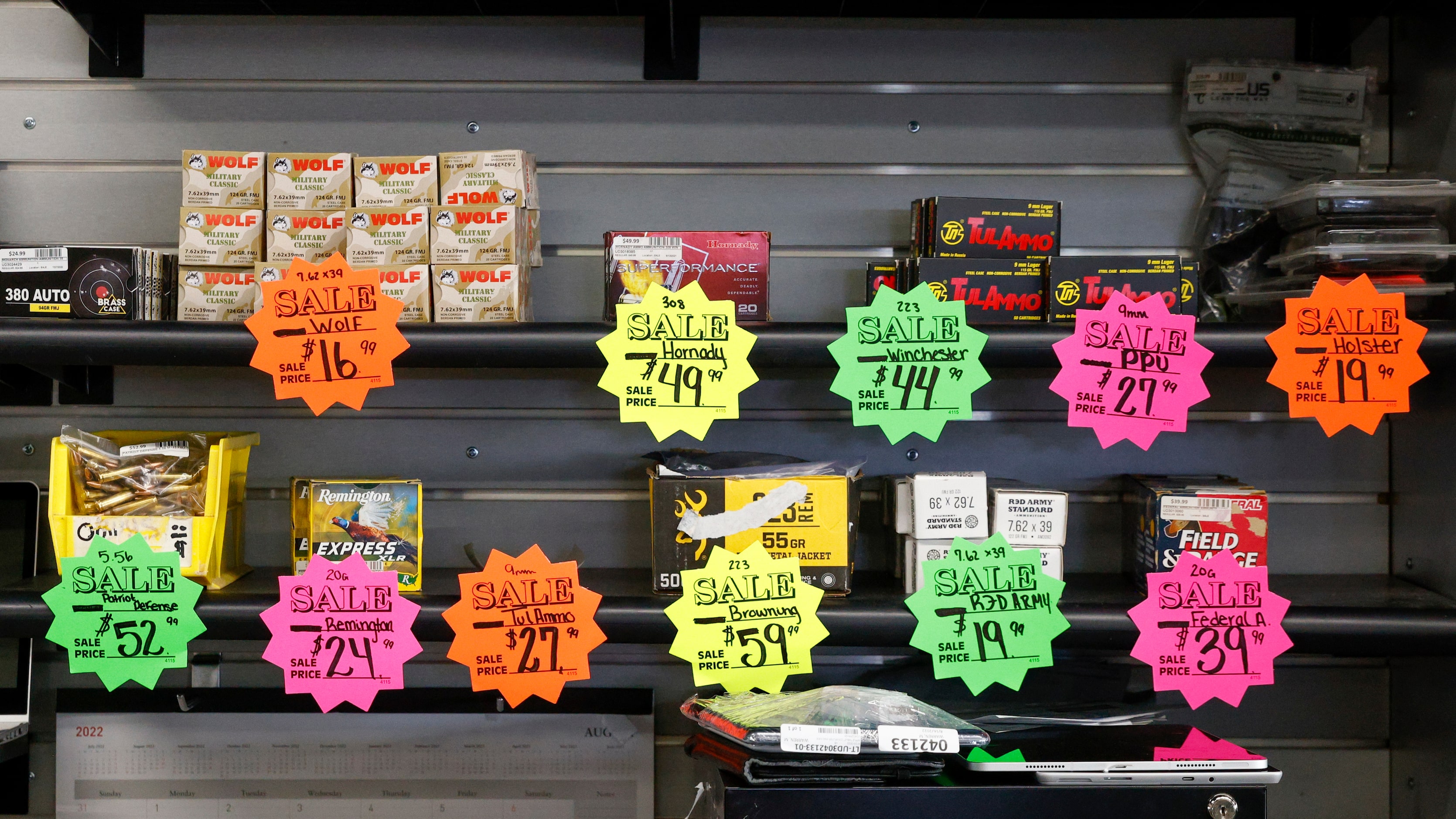 Various types of ammo sit on a shelf for sale at Uncle Dan’s Pawn Shop in Mesquite, Texas,...