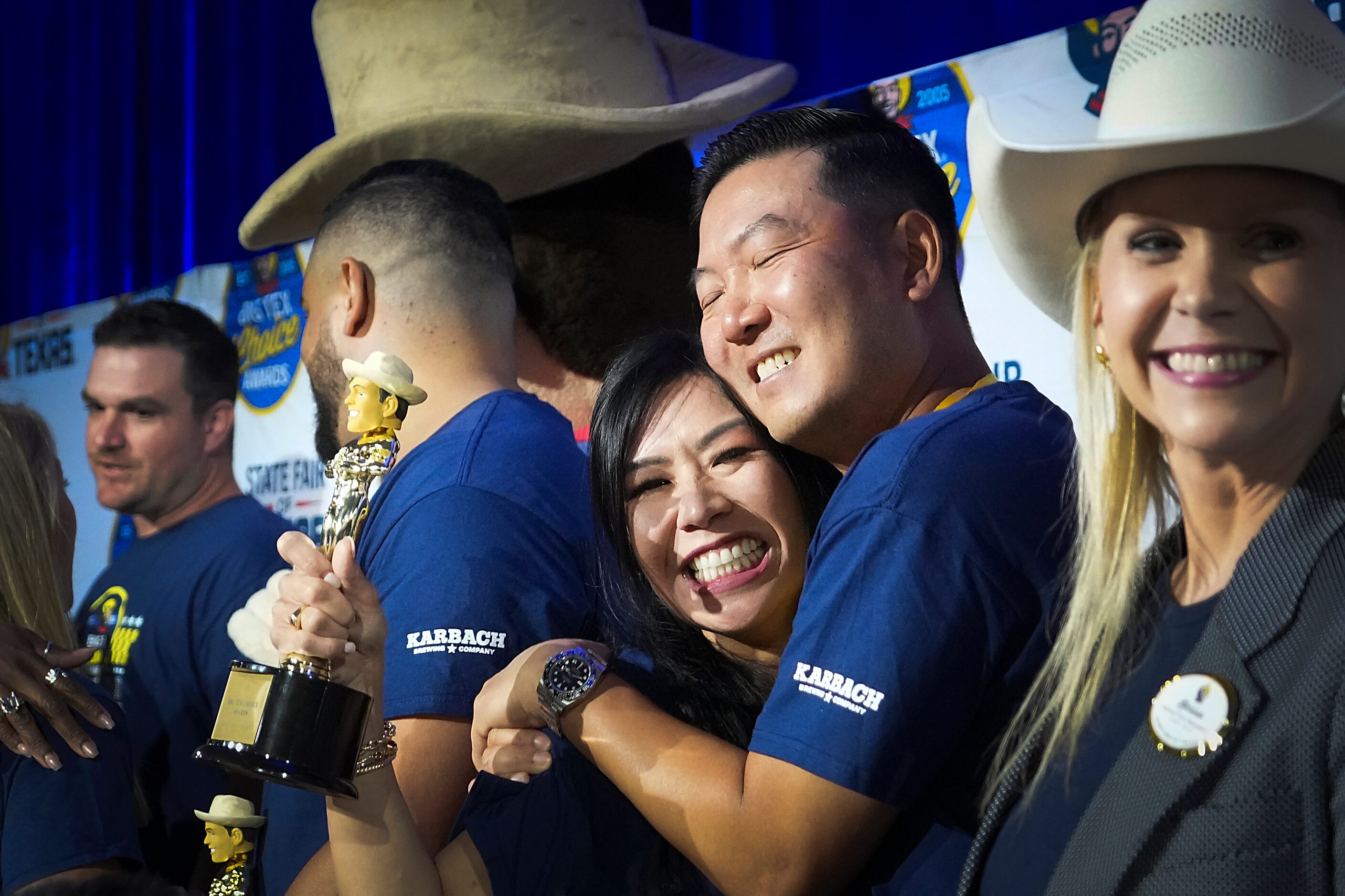 Michelle Le celebrates with her husband Lam Le after winning 'best taste - savory' for their...