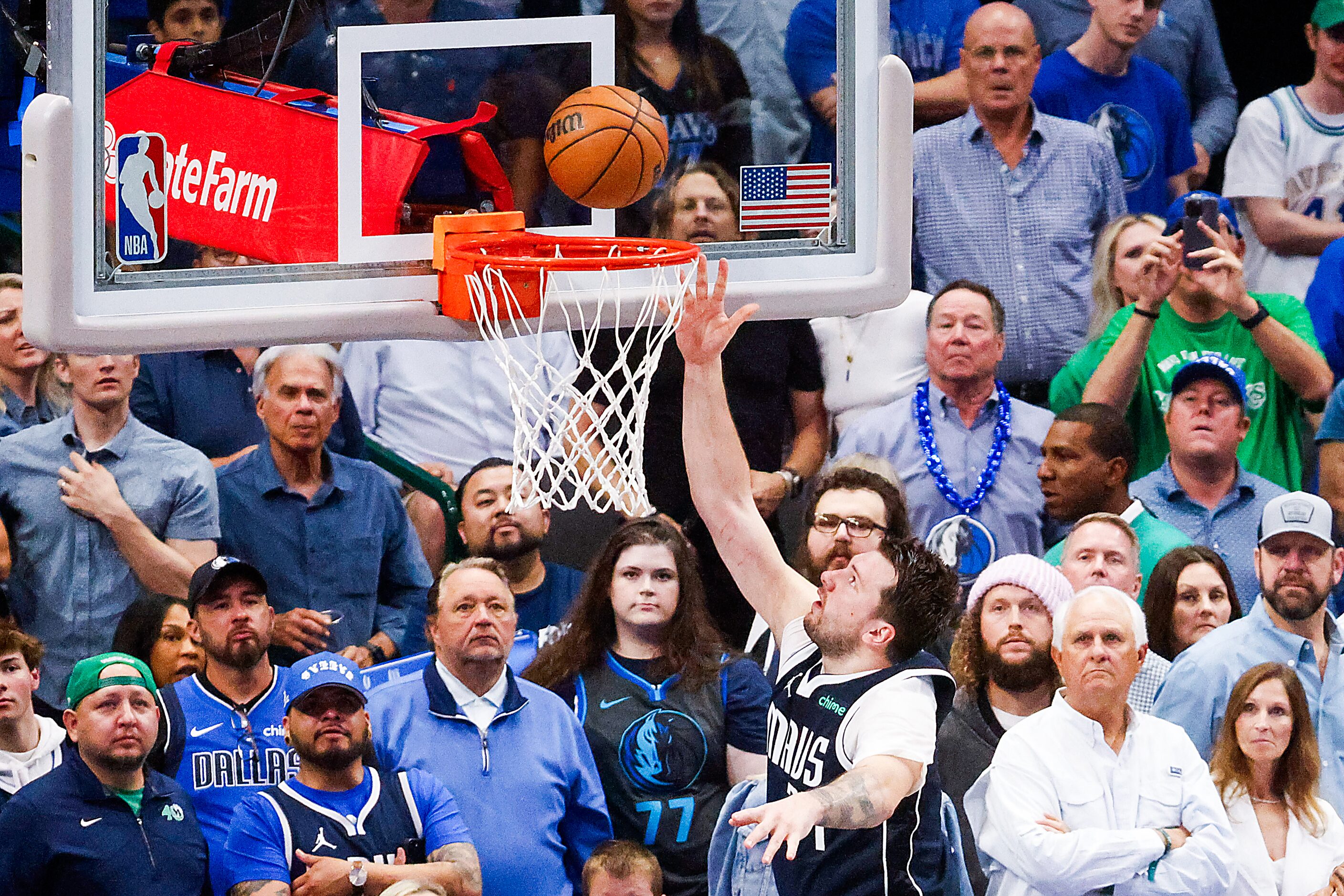 Dallas Mavericks guard Luka Doncic goes up layup against the LA Clippers during the second...