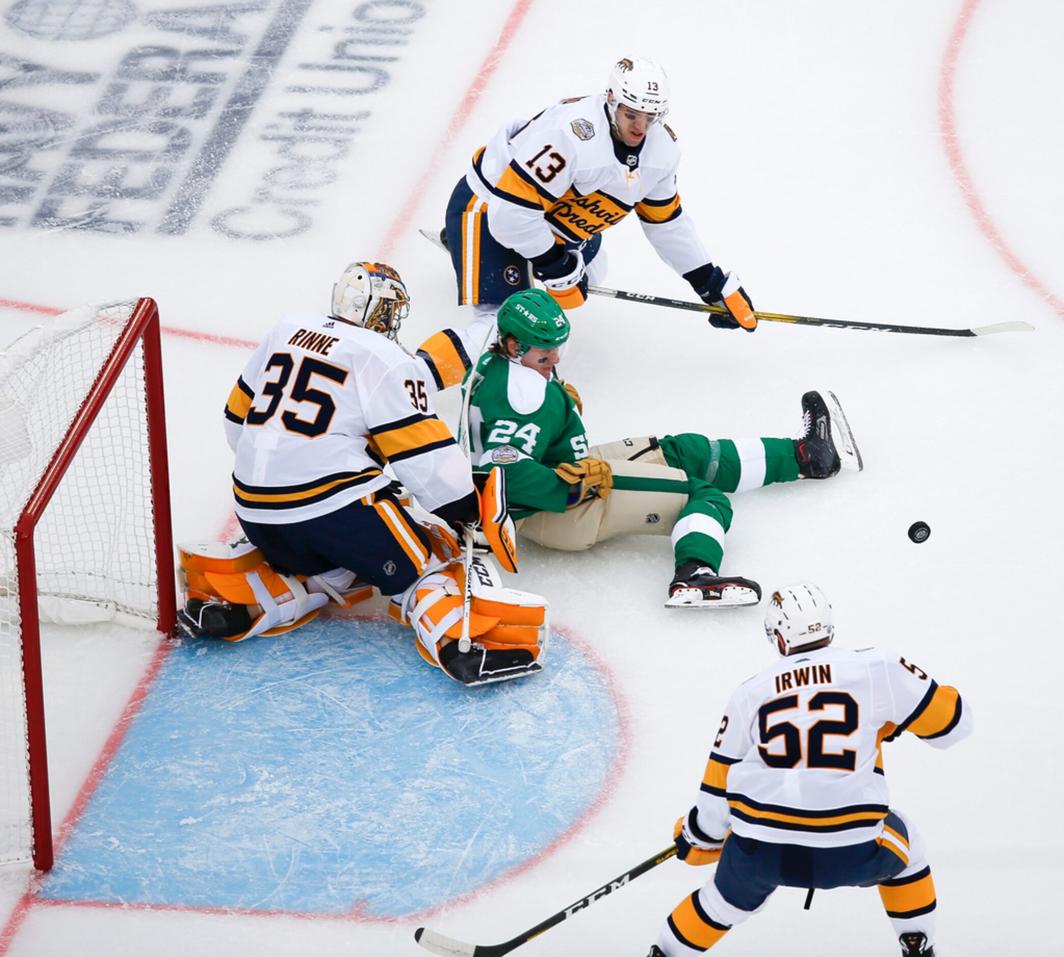 Dallas Stars left wing Roope Hintz (24) falls to the ice after failing to score past...