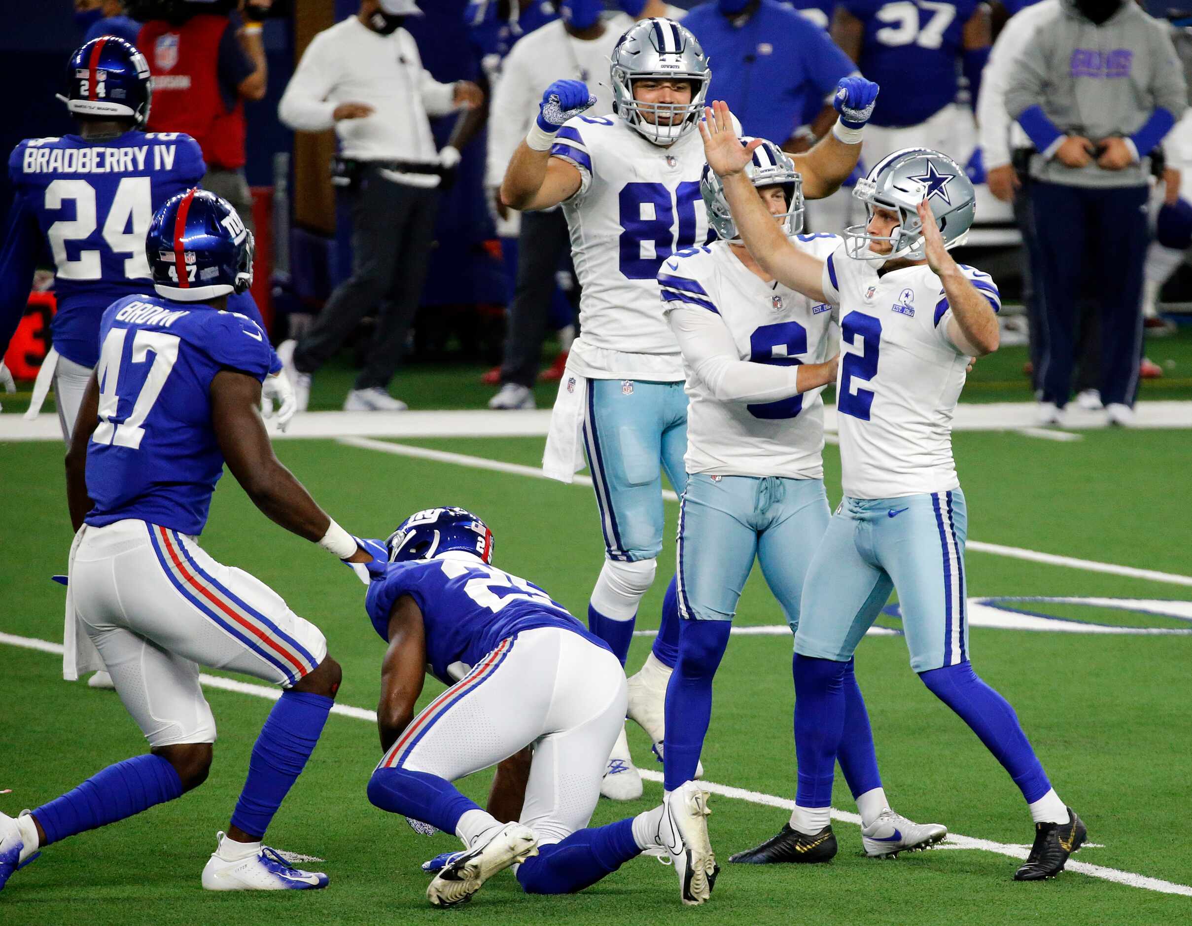 Dallas Cowboys kicker Greg Zuerlein (2) celebrates his last second, game-winning field goal...