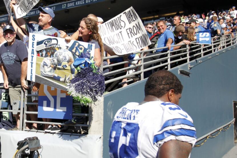 Seahawks fans use posters an a photo from a previous Seahawks playoff win to taunt Cowboys...