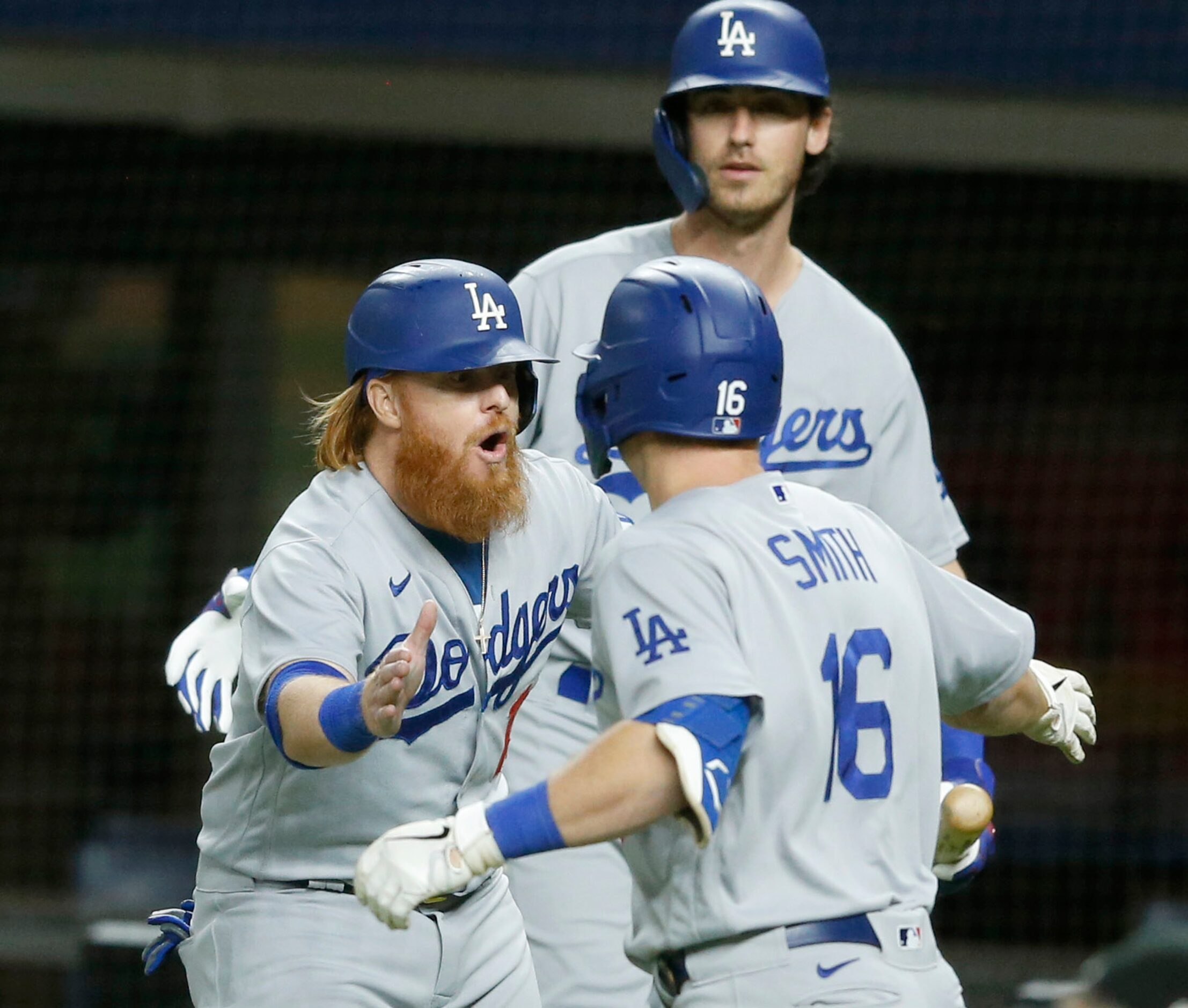 Los Angeles Dodgers catcher Will Smith (16) celebrates with Los Angeles Dodgers third...